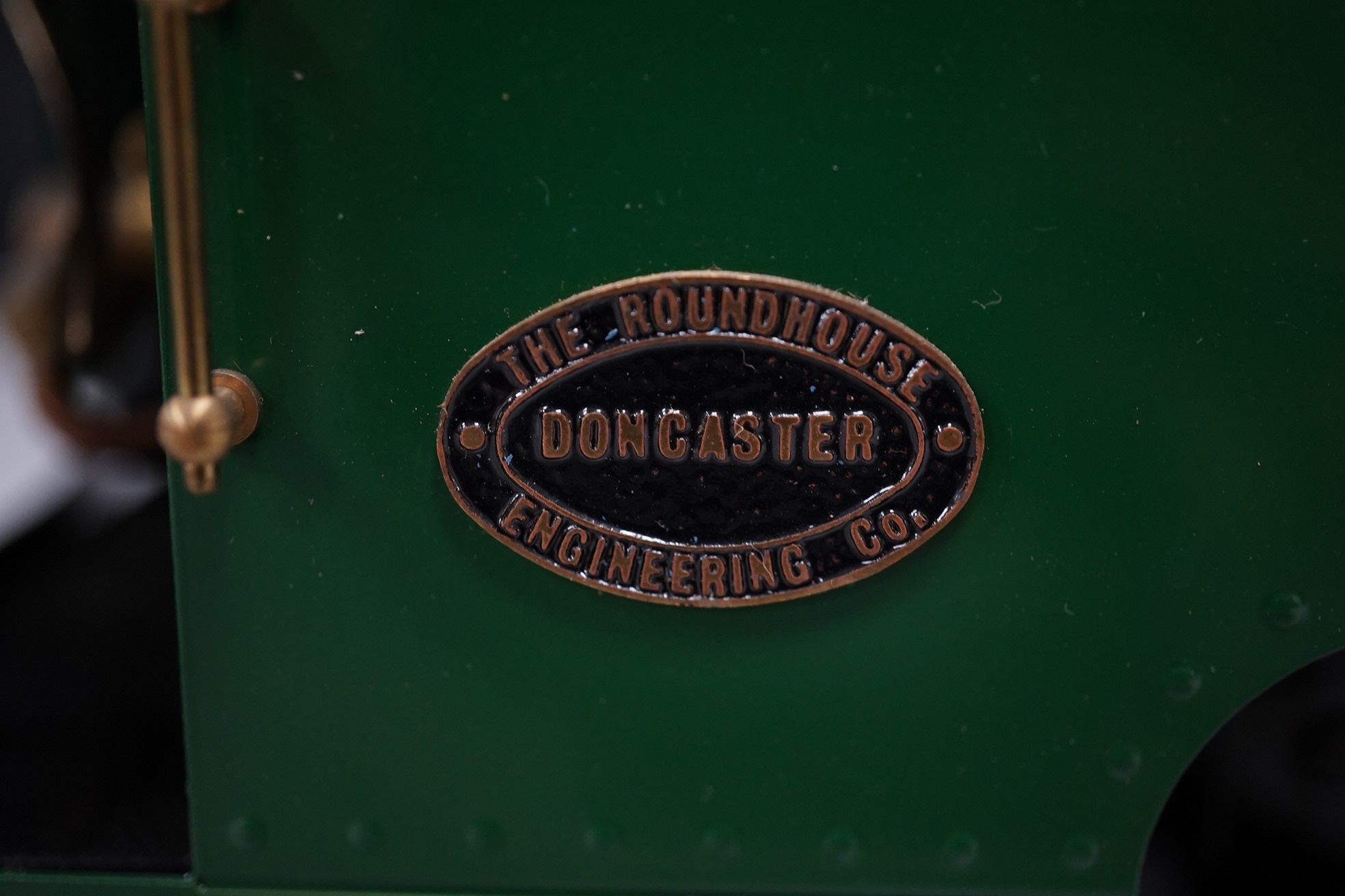 A Roundhouse 16mm scale live steam ‘Billy’, 0-4-0T gas fired locomotive set for 45mm track, with simplified Walschaerts type valve gear, in green livery, with owners handbook. Condition - good.